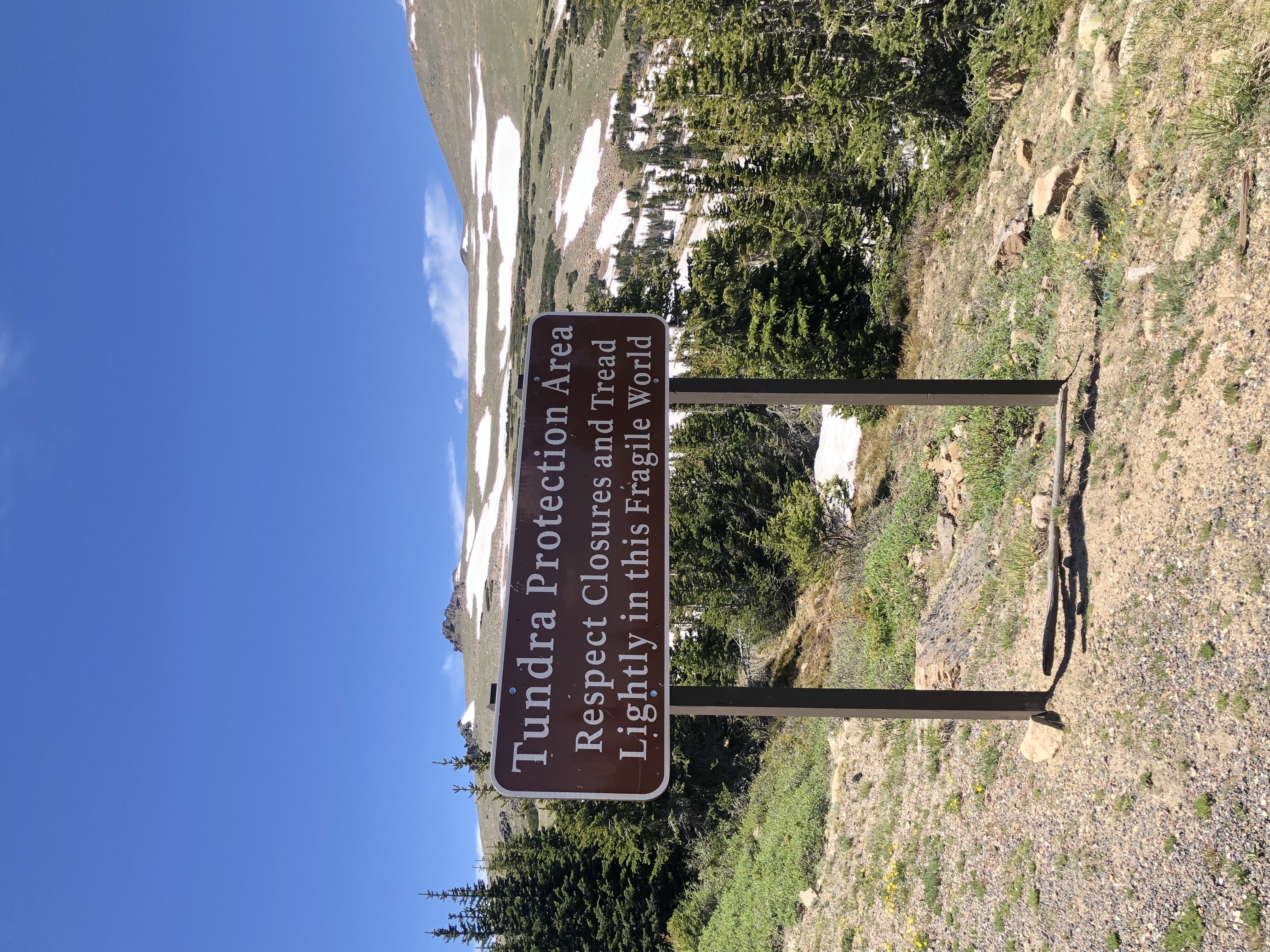 Sign in ROcky Mountain National Park reading 'Tundra Protection Area: Respect Closures and Tread Lightly in this Fragile World